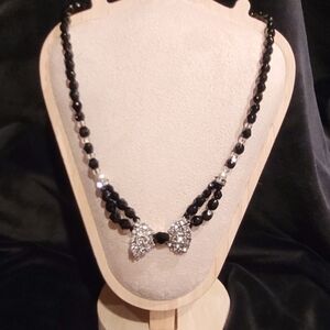 Elegant Black Beaded Necklace with Crystal Bow Accent